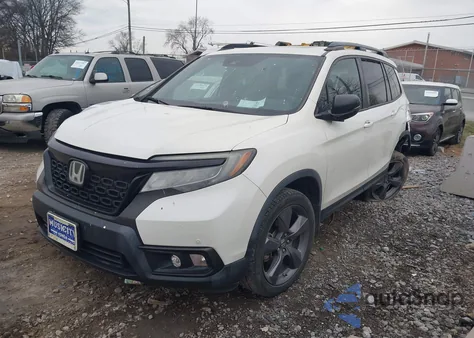 2019 Honda Passport Touring from USA, damaged, VIN 5FNYF7H9XKB001304